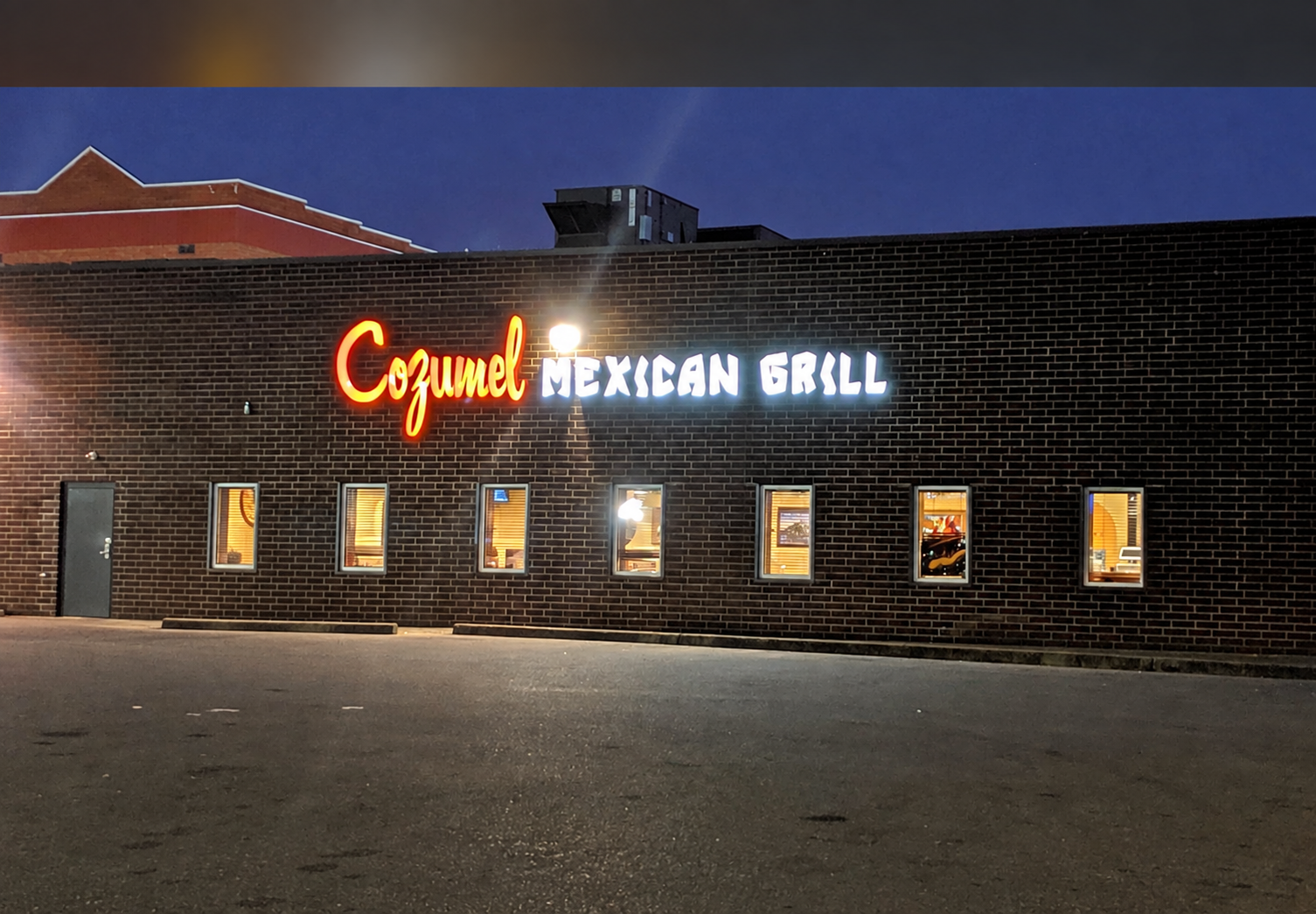 Cozumel Mexican Grill on the side of 49 Olde Main Plaza in St. Albans