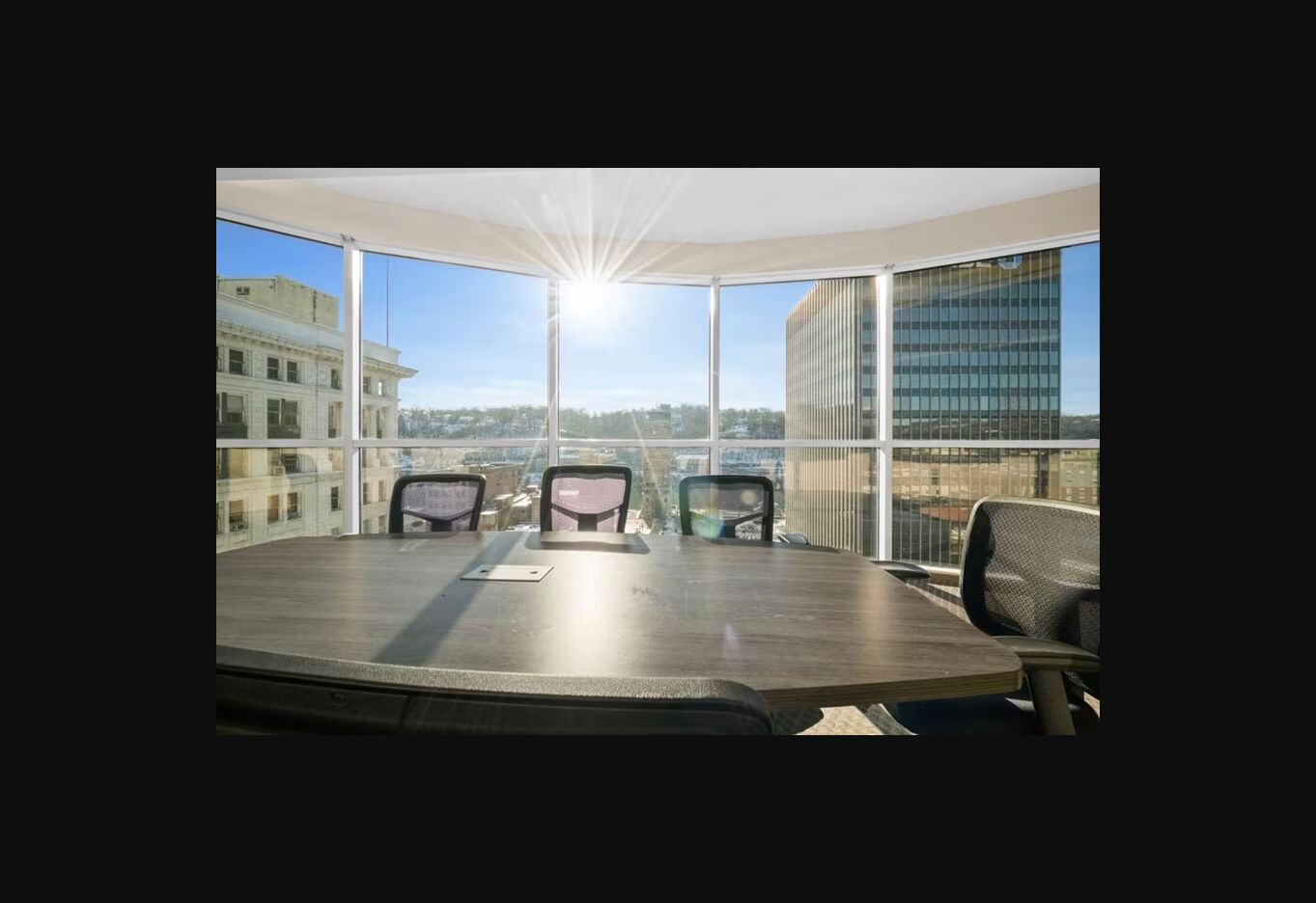 Conference room and downtown views from Suite 1000 at 109 Capitol Street